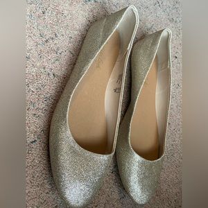 American Eagle women’s size 12 flat glittery gold shoes.